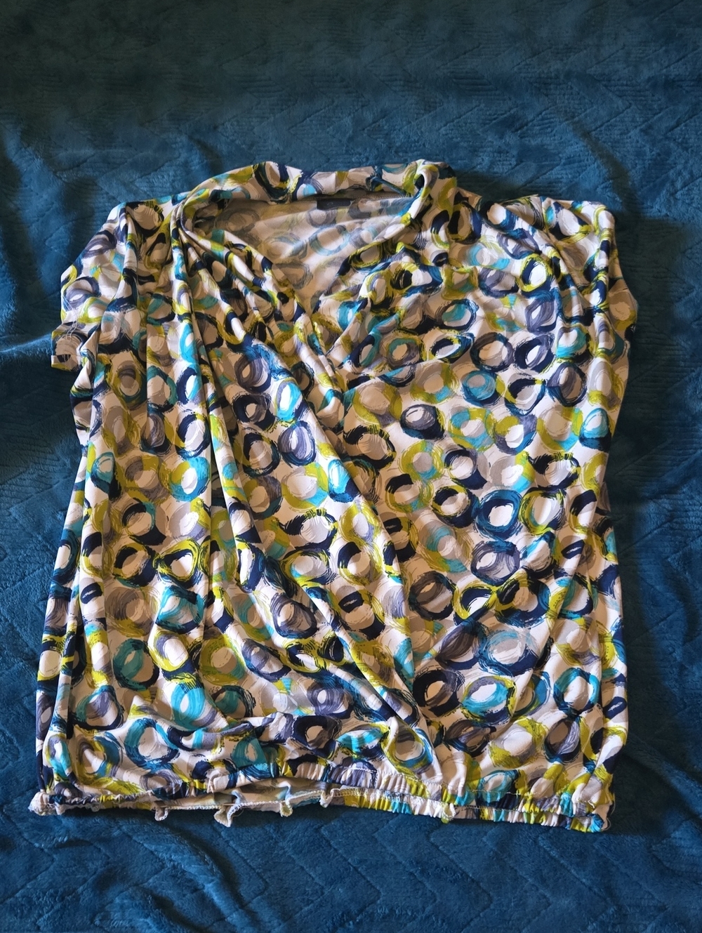 Sleeveless V-Neck Womenβs Blouse in Blue and Green Circle Print